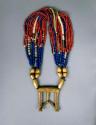 Necklace of brass and glass beads with pendant