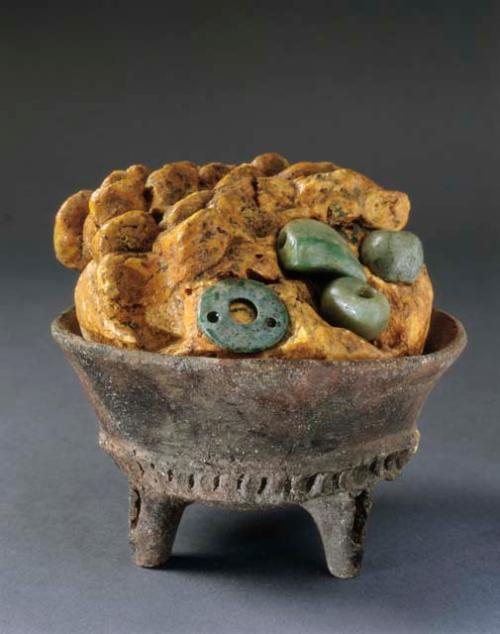 Tripod bowl containing copal and greenstone beads