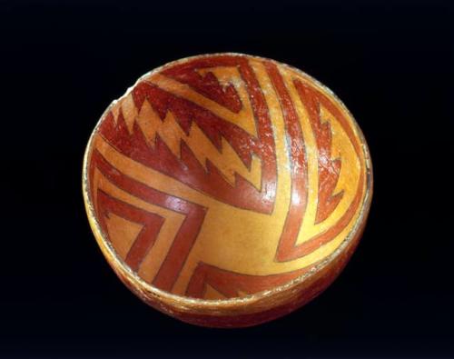 Pottery bowl with red and orange design