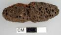 Medicine stone (haury). cylindrical, equally pointed at both ends. horizonatal g