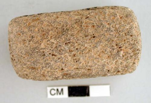 "hand rasp". rectangular block. ressembles miniature flat slab metate. one sligh