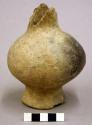 Ceramic jar, narrow base and neck, large round body, plain, neck broken