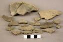 Ceramic rim and body sherds, notched rim, shell temper, mended