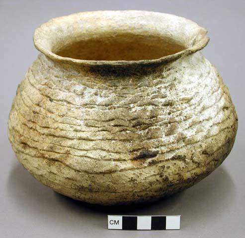 Corrugated pottery jar