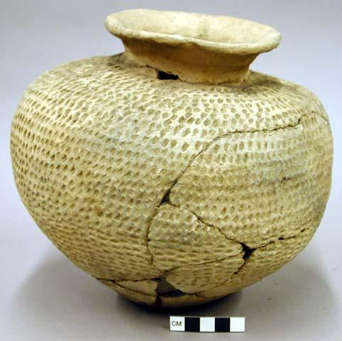 Tooled pottery jar