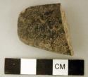 Ground stone, worked stone fragment