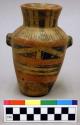 Ceramic vessel, polychrome, funnel shaped body, flat base, two handles