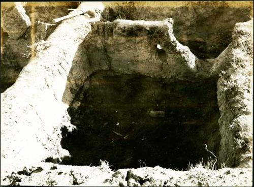 Scan of photograph from Judge Burt Cosgrove photo album. October- November 1933. Pendleton Ruin. Doorway with opening at side in south wall of Room 22.