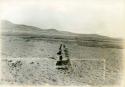 Scan of photograph from Judge Burt Cosgrove photo album. Oct.Nov.1933 Pendleton Ruin.  East walls of East House.