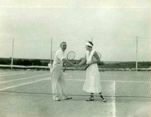 Scan of photograph from Judge Burt Cosgrove photo album. Sept.1-1932 "The winners" C.B.Cosgrove Jr. and Harriet Lockwood. At Country Club in Atchison Kans.