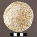 Stone ball. spherical cobble. entire surface appears pecked, ceremonial, game,