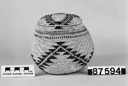 Lidded trinket basket from the collection of Mrs. H.S. Grew. Plain, three-strand and lattice twined, one-face overlay.