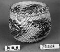 Lidded trinket or storage basket. From the collection of G. Nicholson and C. Hartman. Plain and three-strand twined, one-face overlay.