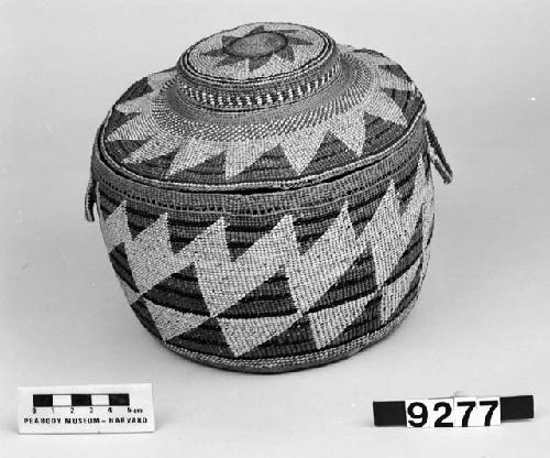 Lidded trinket or storage basket from the collection of J.A. Reeve, ca. 1897. Plain and three-strand twined, one-face overlay.