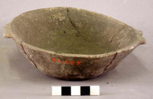 Small pottery bowl with 2 lugs