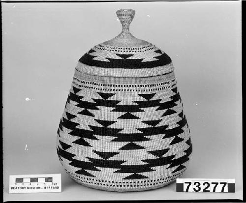 Lidded trinket basket from Mrs. Hecko. From the collection of G. Nicholson and C. Hartman. Plain and three-strand twined, one-face overlay.