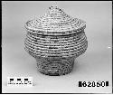 Lidded basket from the collection of Dr. Granville. Close coiled.