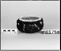 Feathered and beaded basket from the collection of the brothers of Mrs. J.M. Robinson, 1883-1925. Coiled, three-rod foundation.