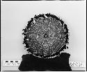 Feathered and beaded plaque. Coiled, three-rod foundation. From the collection of C.P. Wilcomb.