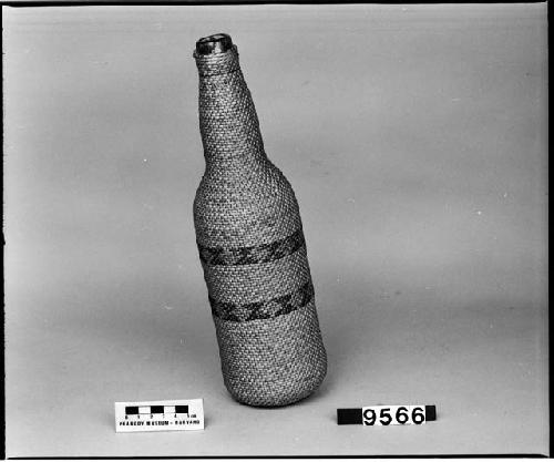 Covered bottle, from the collection of the parents of L. Frankenstein, pre-1902. Diagonal twined.