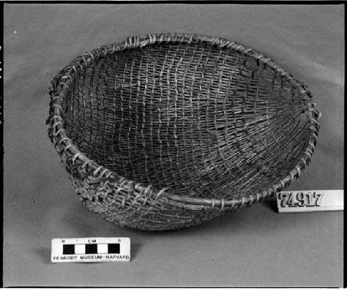 Sieve or basket plate made by Old Vaqui's woman, Murphy's. From the collection of G. Nicholson and C. Hartman. Open twined, alternating pairs of warps.