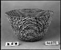 Mush or cooking bowl from a collection through G. Nicholson. Coiled, interlocking stitches, three rod.