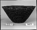 Mush or cooking bowl rescued from pyral fire. From a collection through G. Nicholson. Coiled, interlocking stitches, three rod.