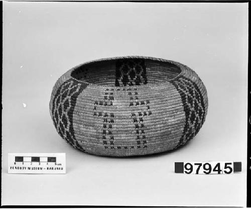 Globular basket from unknown collection. Coiled.