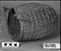 Utility basket made by Old Nezie, Ross Ranch, near North Fork. Collected by C. Hartman for G. Nicholson. Open twined.