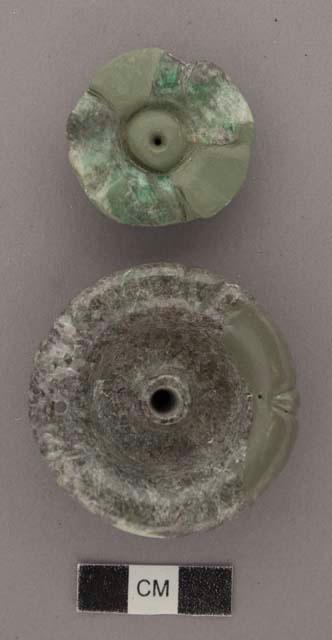 Fragment of decorated jade button