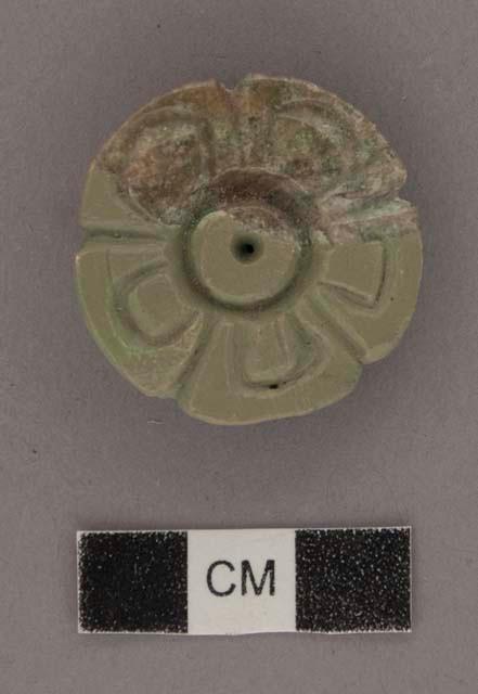 Fragment of jade rosette button