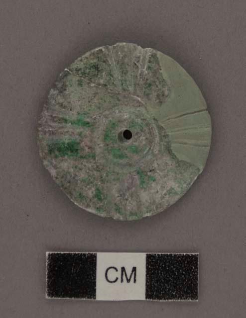 2 fragments of carved jade disc - thickenss, 3.5 mm. max.; diam. 35.1 mm.