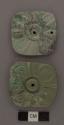 7 fragments of a pair of squarish jade  rosettes