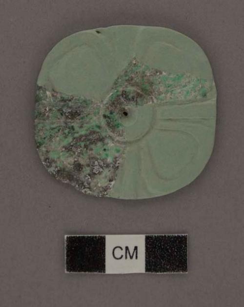 2 fragments of carved jade rosette