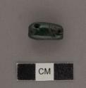 Carved jadeite bead or pendant