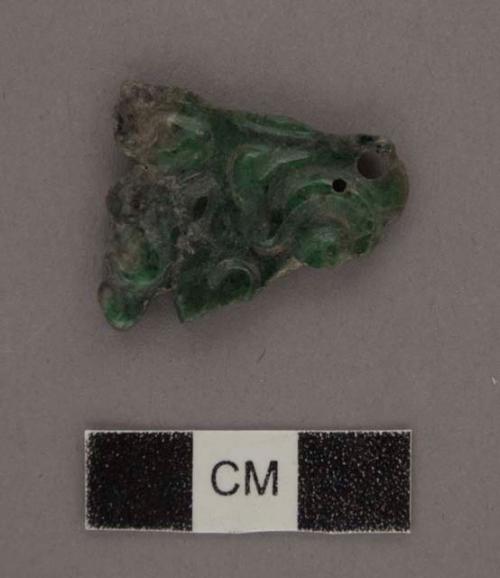 One fragment of thin dark green and black jade flat carving 27x 23x 3 mm.