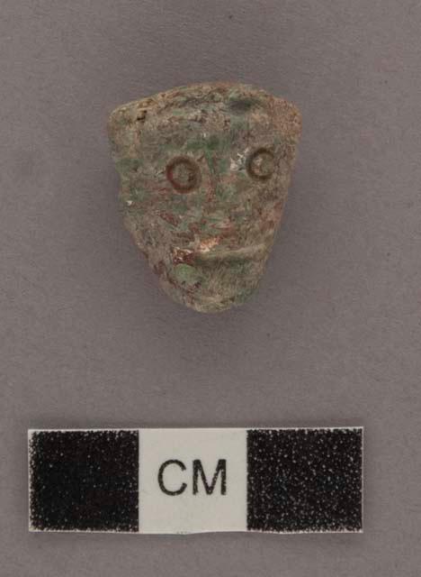 Small stone head - pierced laterally