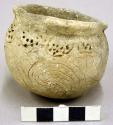 Complete ceramic bowl, scalloped rim, incised and punctate decoration