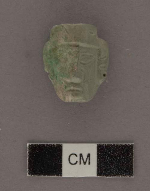 Fragment of jade human head - 21.8x13x7.7 mm.