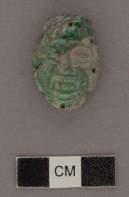 2 fragments of jade human head - 29.8x16.1x10.5 mm.