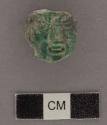 Fragment of jade human head - 18.5x18.6x11 mm.