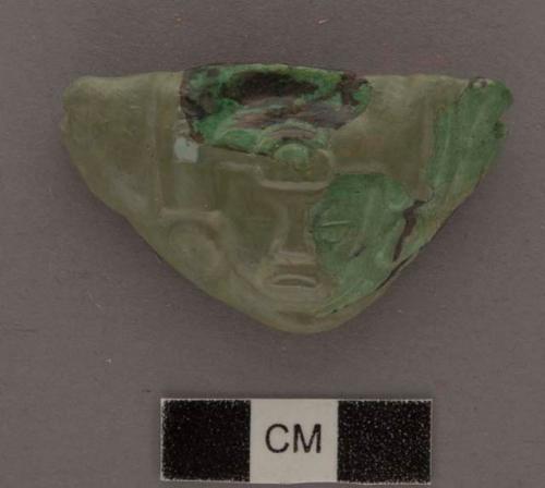 3  fragments of  jade triangular low relief human head - 39x27x11.8 mm.