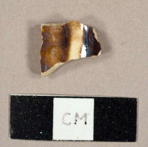 Brown lead-glazed ceramic sherd, possibly Rockingham-type ware