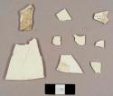 Creamware sherds, including one rim sherd to a scalloped-edged plate
