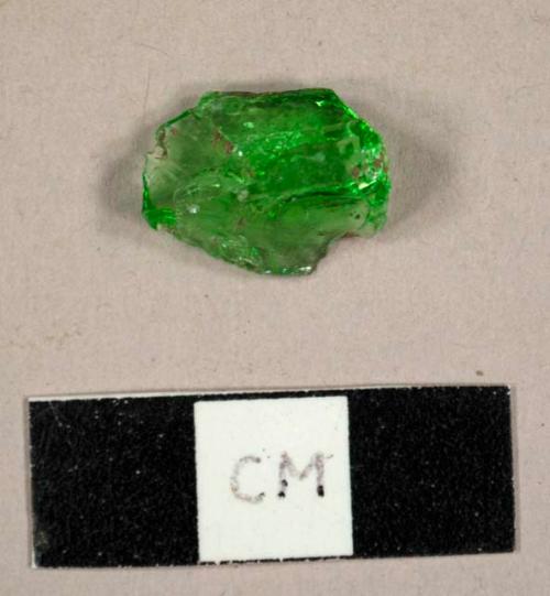 Base fragment of a green glass bottle