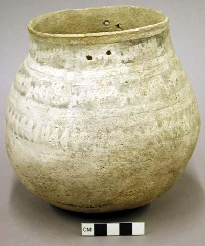Black on white pottery jar