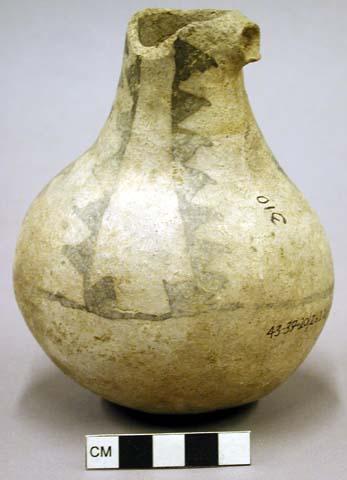 Black on white pottery bottle