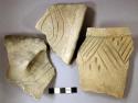 Ceramic, earthenware rim sherds, shell-tempered, incised, cord-impressed, and punctate, one with strap handle, possible Ramey incised