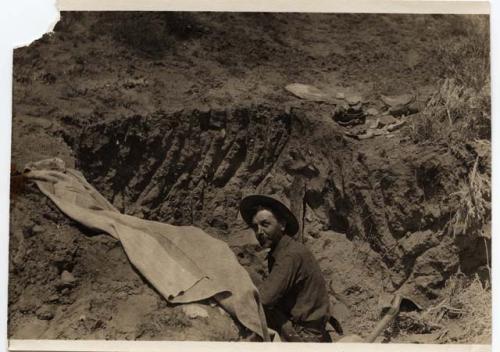 S.J. Guernsey excavating at Marsh Pass, 1914