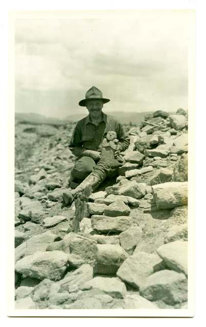 Man with idol from Kiva 12. Pecos, 1925.